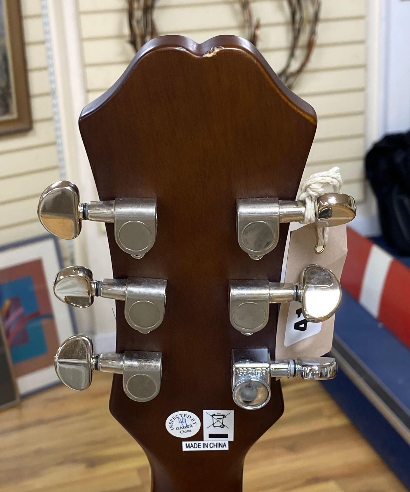An Epiphone acoustic guitar, model DR-220SVS, in soft case